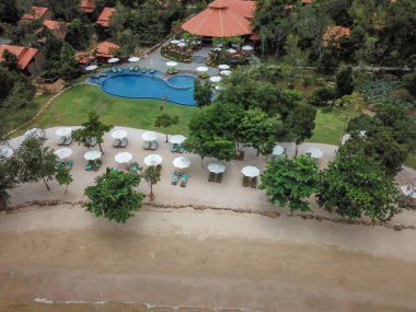 Green Bay Phu Quoc Resort & Spa'nın havadan görünümü. Plaj ve okyanus yanında özel villa ve havuzları ile lüks bir tatil. Phu Quoc, Vietnam