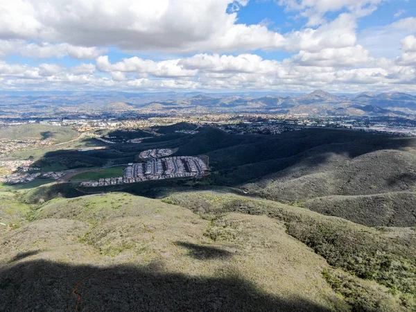View from the top of the Black Mountain of Carmel Valley with suburban neighborhood with identical villas next to each other. San Diego, California, USA.