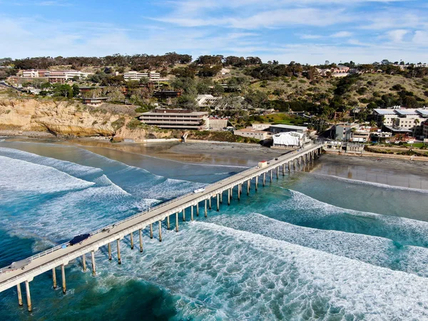 Aerial view of the scripps pier institute of oceanography, La Jolla, San Diego, California, USA. Research pier used to study ocean conditions and marine biology.