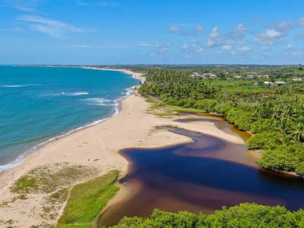 Aerial view of river merging to tropical ocean — Stock Photo, Image