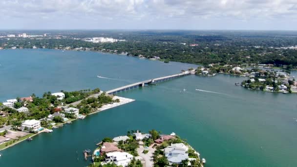 Aerial view of street bridge crossing ocean — Stock Video