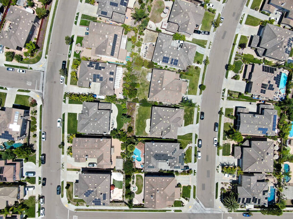 Aerial view of rich neighborhood with big villas with pool in San Diego, California, USA. Aerial view of residential modern subdivision luxury mansions.