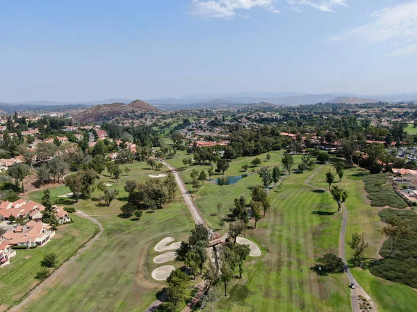 Aerial view of golf in middle class neighborhood surrounded with residential house, South California — Stock Photo, Image