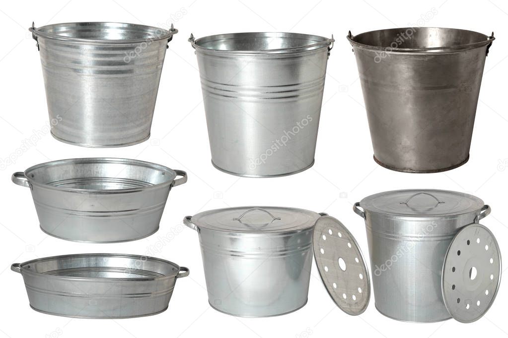 Collection of metal zinc buckets and bowls isolated over white background, set of seven objects