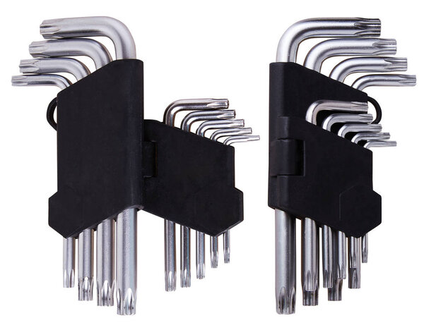 Набор шестигранных ключей (ключей Аллена) в черном пластиковом держателе изолирован на белом фоне. Этот инструмент используется для привода болтов и винтов с шестиугольными розетками в голове. L-образный шестигранный ключ
