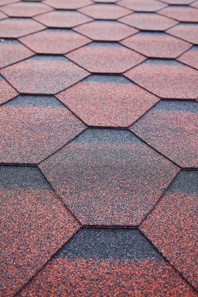 Soft roof, roof tiles. Flexible shingles. Roof tiling texture. Flexible, soft, bituminous, composite