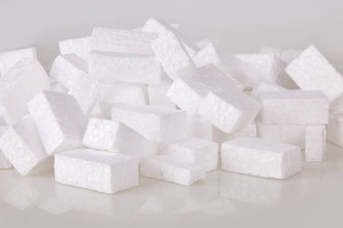 Dolgu ambalaj arka plan. Ambalaj köpük doku, üstten görünüm, yakın çekim unsurlardandır. Polistren, beyaz Strafor ambalaj fıstık kırılgan nesnelere nakliye sırasında zarar görmesini önlemek için kullanılan.