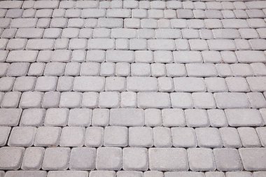 Kaldırım arka plan gri. Kaldırım doku. Perspektif görünümü monoton gri tuğla taş yere sokak yol için. Kaldırım, Driveway, döşeme, kaldırım. Kare desen 