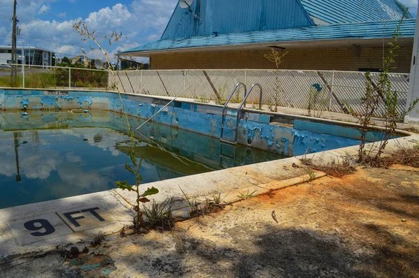 Old Dirty Pool at an Abandoned Deteriorating Motel