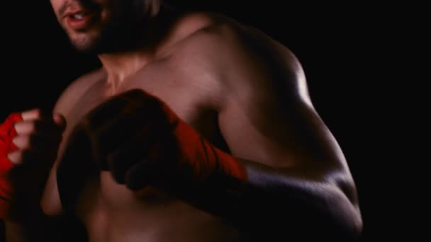 Male Boxer Wrapped Hands Fight Training Process Black Background Slow — Stock Video