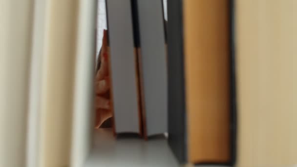 Caucasian Young Beautiful Woman Glasses Choosing Book Books Shelves Home — Stock Video