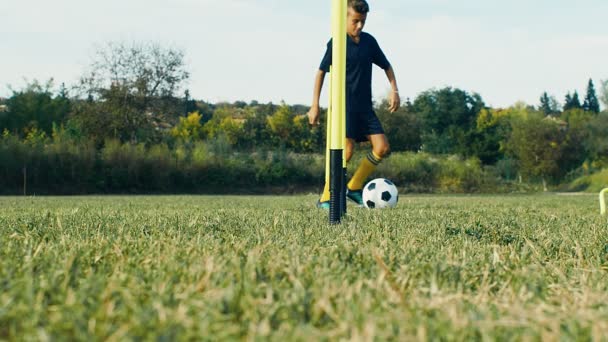 Kid Boy Training Soccer Ball Field Slow Motion — Stock Video