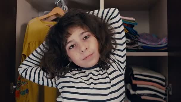 Cute Caucasian Kid Girl Posing Different Clothes Open Wardrobe Looking — Stock Video