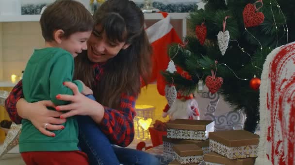 Christmas Gifts Concept Mother Gives Her Little Boy Christmas Present — Stock Video