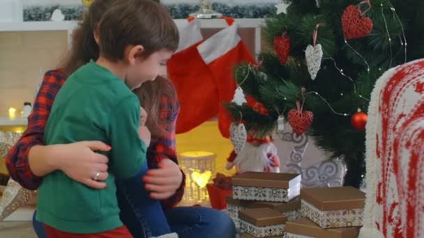 Christmas Gifts Concept Mother Gives Her Little Boy Christmas Present — Stock Video