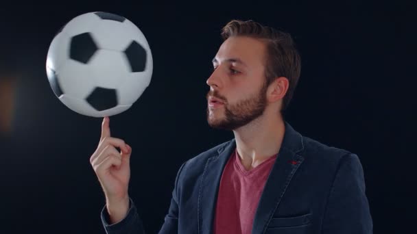 Joven Girando Una Pelota Dedo Fondo Negro Cámara Lenta — Vídeos de Stock