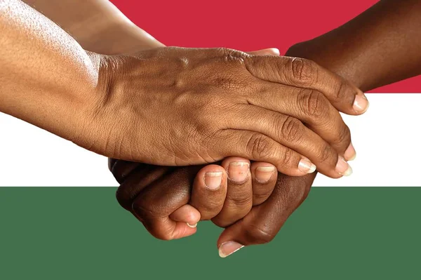 Hungary flag, intergration of a multicultural group of young people.
