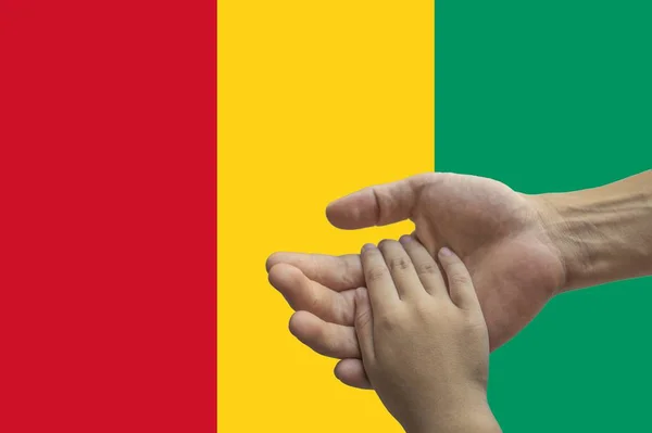 Flag of Guinea, intergration of a multicultural group of young people — Stock Photo, Image