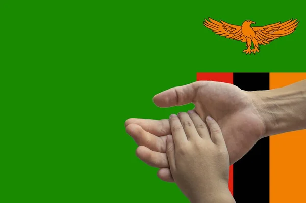 Zambia flag, intergration of a multicultural group of young people — Stock Photo, Image