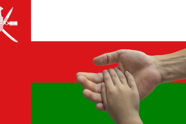 Flag of Oman, intergration of a multicultural group of young people — Stock Photo, Image