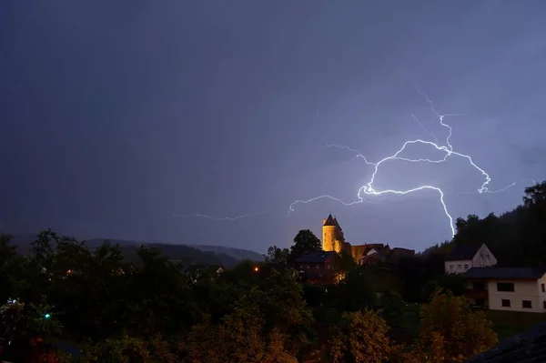 Nightly thunderstorm over Bertrada Castle in Germany