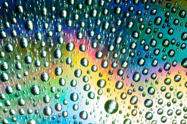 Macro Gotas Agua Sobre Fondo Multicolor —  Fotos de Stock