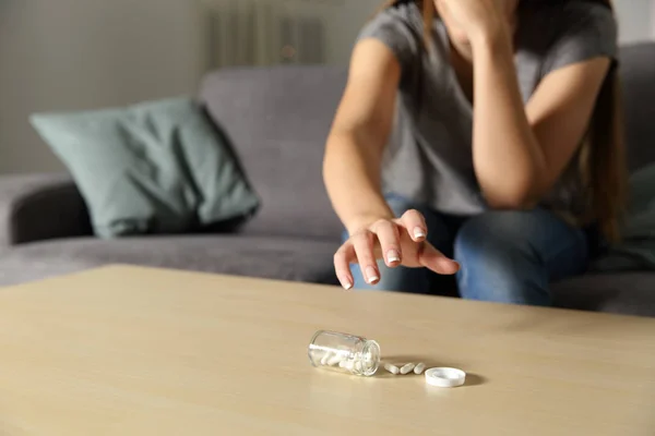 Depressed Girl Catching Antidepressant Pills Sitting Couch Living Room Home — Stock Photo, Image