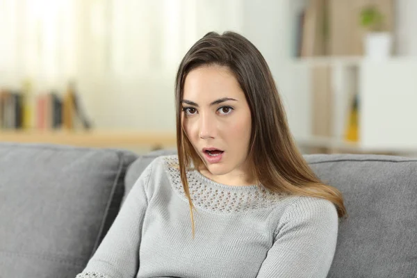 Portrait Perplexed Woman Looking Camera Sitting Couch Living Room Home — Stock Photo, Image