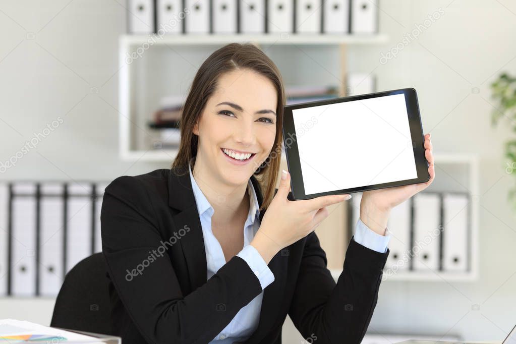 Happy office worker showing an horizontal tablet screen mock up