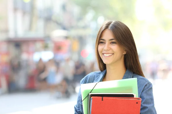 Estudiante Feliz Sosteniendo Carpetas Caminando Calle —  Fotos de Stock