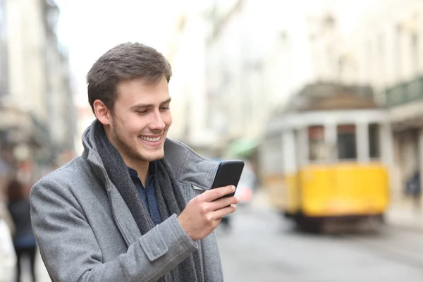 Happy Man Uses Smart Phone Walking City Old Town — Stock Photo, Image