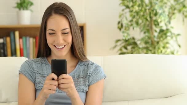 Cheater Woman Dating Line Smart Phone Boyfriend Spying Sitting Sofa — Stock Video