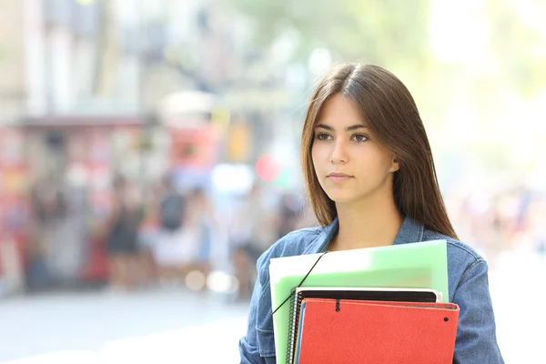 Portrait Serious Student Holding Folders Walking Looking Away Street — Stock Photo, Image