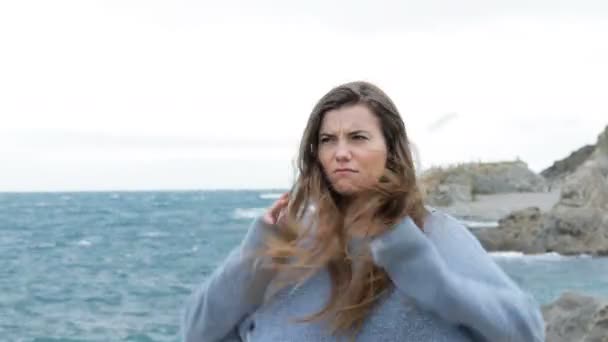 Angry Teen Walking Tousled Hair Windy Day Beach Stock Video