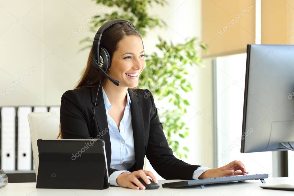 Tele marketer working at office with computer