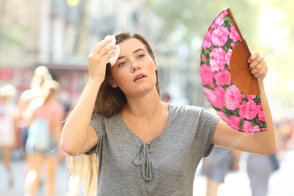 Girl complaining suffering heat stroke