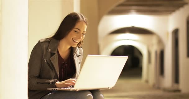 Happy Woman Browsing Laptop Content Sitting Town Street Night — Stock Video