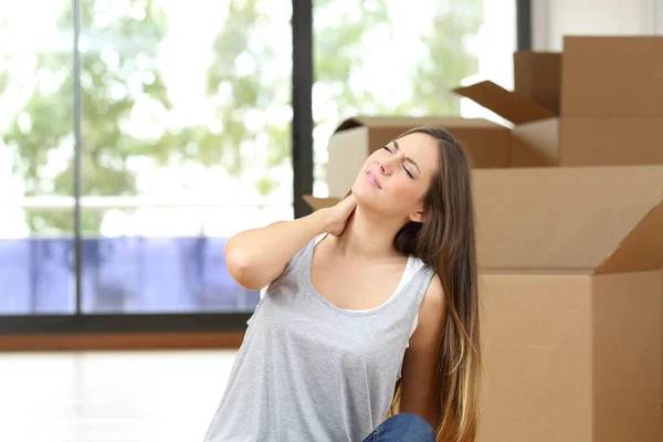 Woman Pain Suffering Neckache Moving Home Surrounded Boxes Sitting Floor — Stock Photo, Image