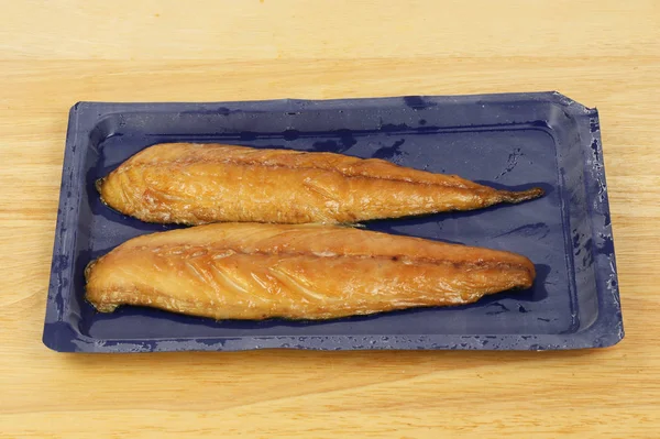 Smoked mackerel in a carton — Stock Photo, Image