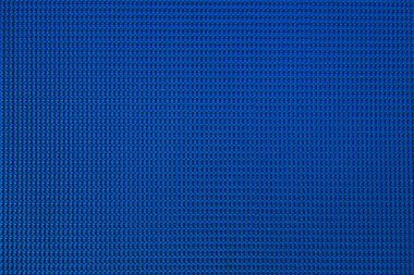 Mavi doku arka plan desen yüzeyi. Mavi soyut plastik, kumaş veya kauçuk doku dikişsiz desen.