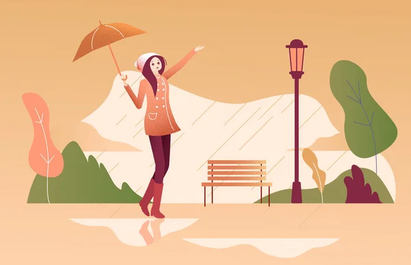 Chica con paraguas camina bajo la lluvia en el parque de otoño . — Vector de stock