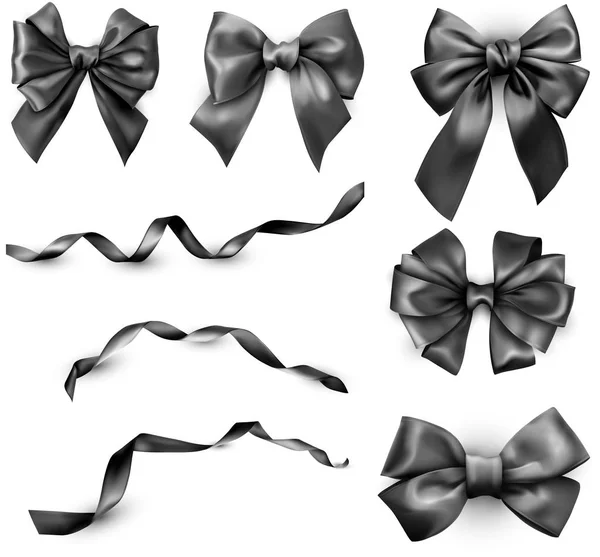 Black realistic satin bows and ribbons isolated on white. — Stock Vector