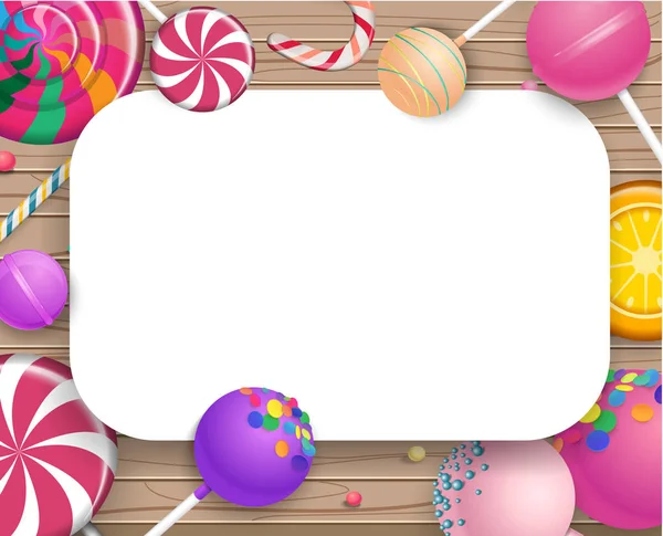 Ahşap arka plan üzerinde renkli lolipop ile beyaz çerçeve.
