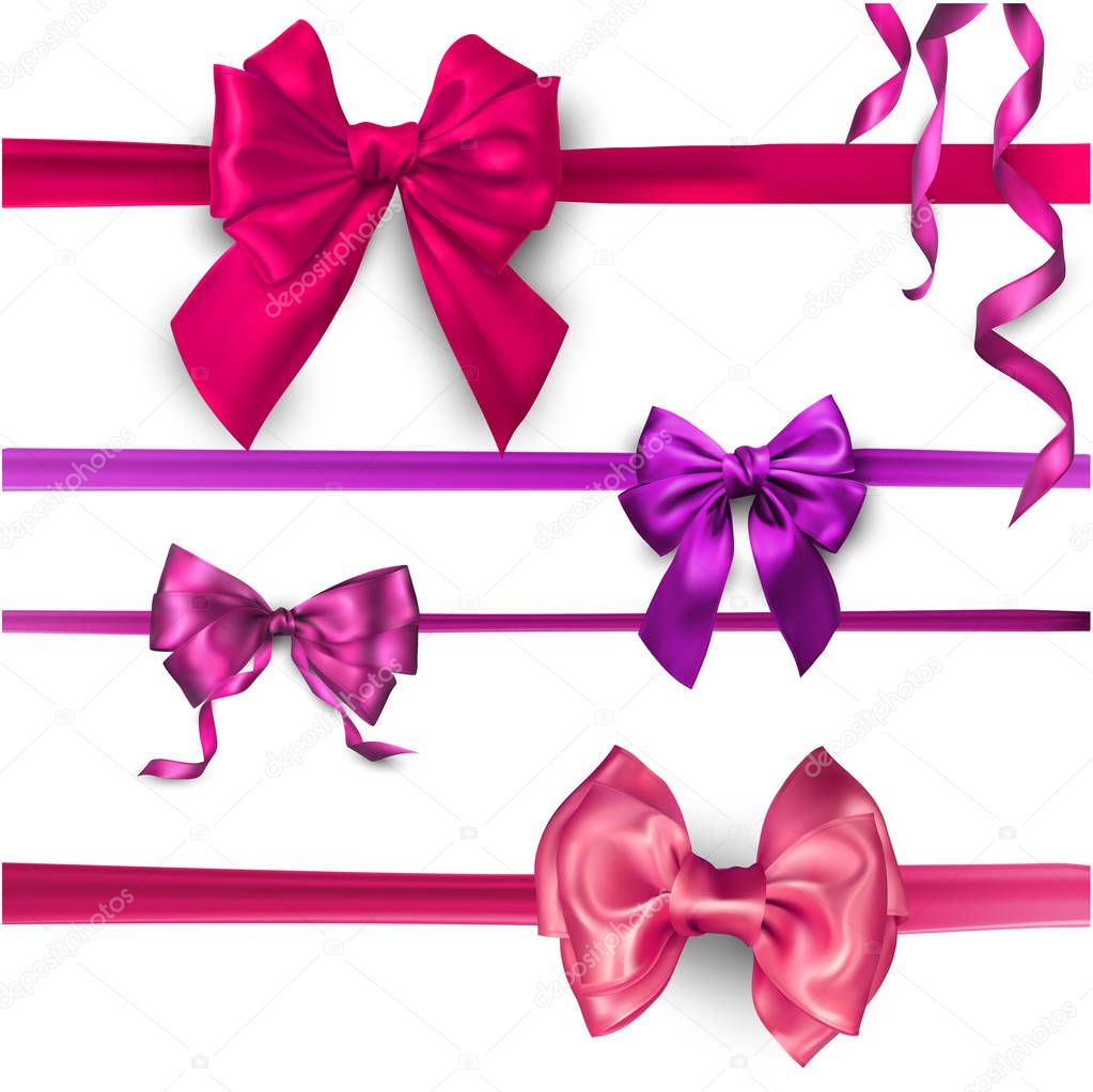 Pink and lilac satin bows isolated on white.