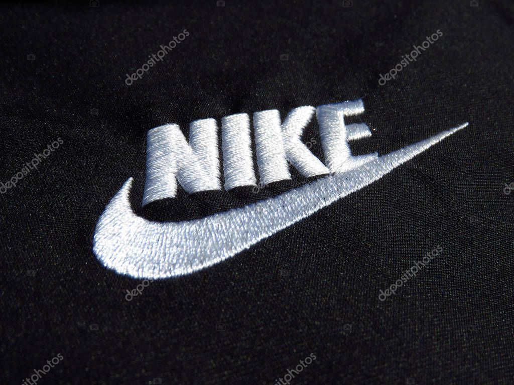 Belgrade, Serbia -  July 11 2019. Embroidered Nike white logo on black polyester shorts.