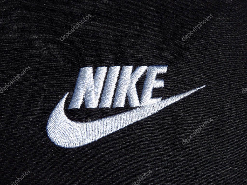Belgrade, Serbia -  July 11 2019. Embroidered Nike white logo on black polyester shorts.