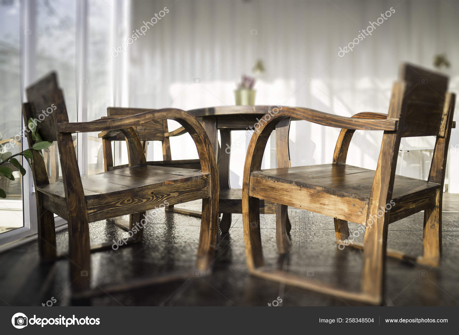 Cargo Container Cafe With Wooden Furniture Set Stock Photo