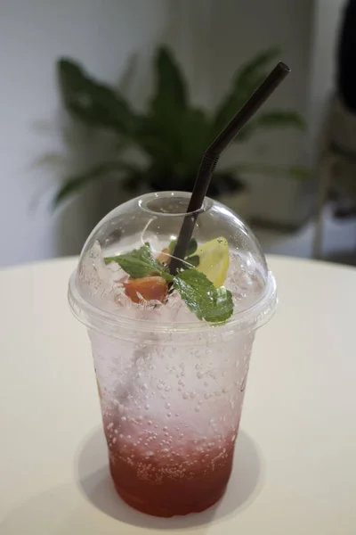 Refreshment drink with iced mix berry soda