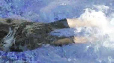 Kadın bacakları su sıçramaları yapmak, stok görüntüleri