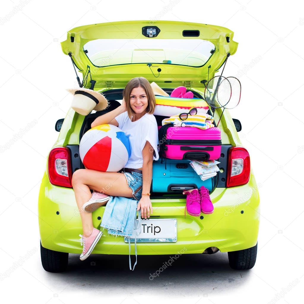 Ready to travel. Woman in Green Overloaded Car with Stuff Things before Trip. Bright Suitcases Luggage Full Stuff Accessories Clothes Ballon. Summer Concept Holiday Adventure Isolated on White.